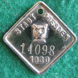 1930, Zn(Ni) Marke (Katzensteuer) (1).JPG